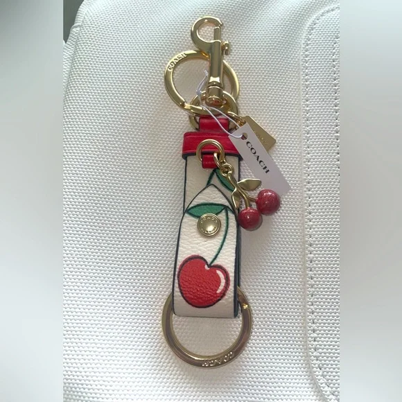 Coach NWT COACH CZ088 Trigger Bag Charm Cherry Leather Key  Coach Cherry Trigger Bag Charm Keychain display picture 1